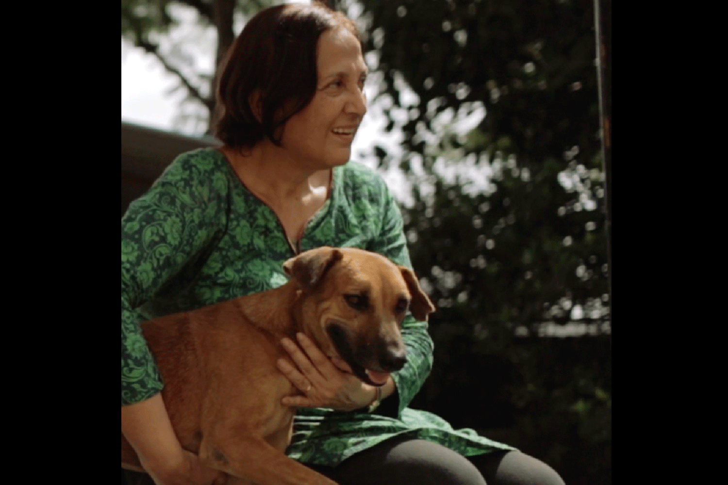 Meet Vivienne. She found her secret to happiness: dedicating her life to saving the street animals in India