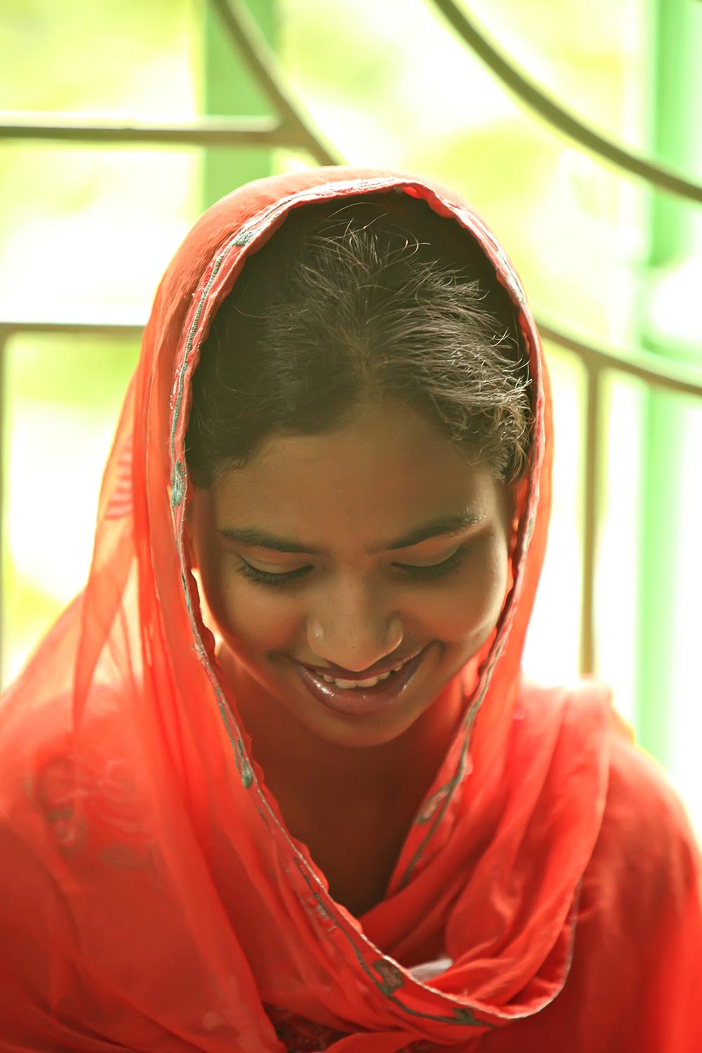 Saiful's bride-in-waiting allows herself a shy smile when we inform her Saiful will be headed home soon