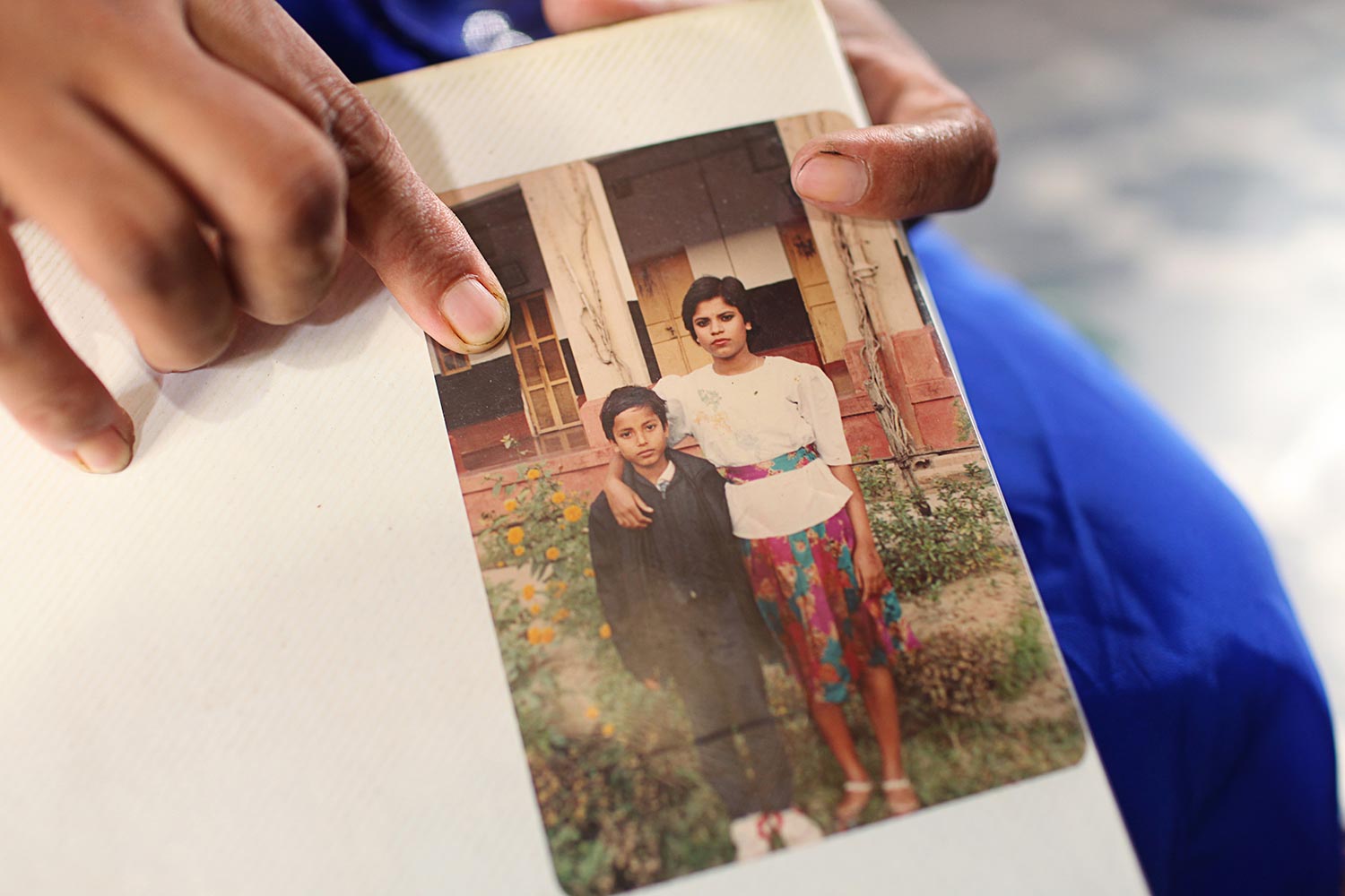 His older sister Bristi shows us a photograph from their childhood days. She constantly refers to him as the baby of the family, the intelligent student at school and the boy who loved football and cricket