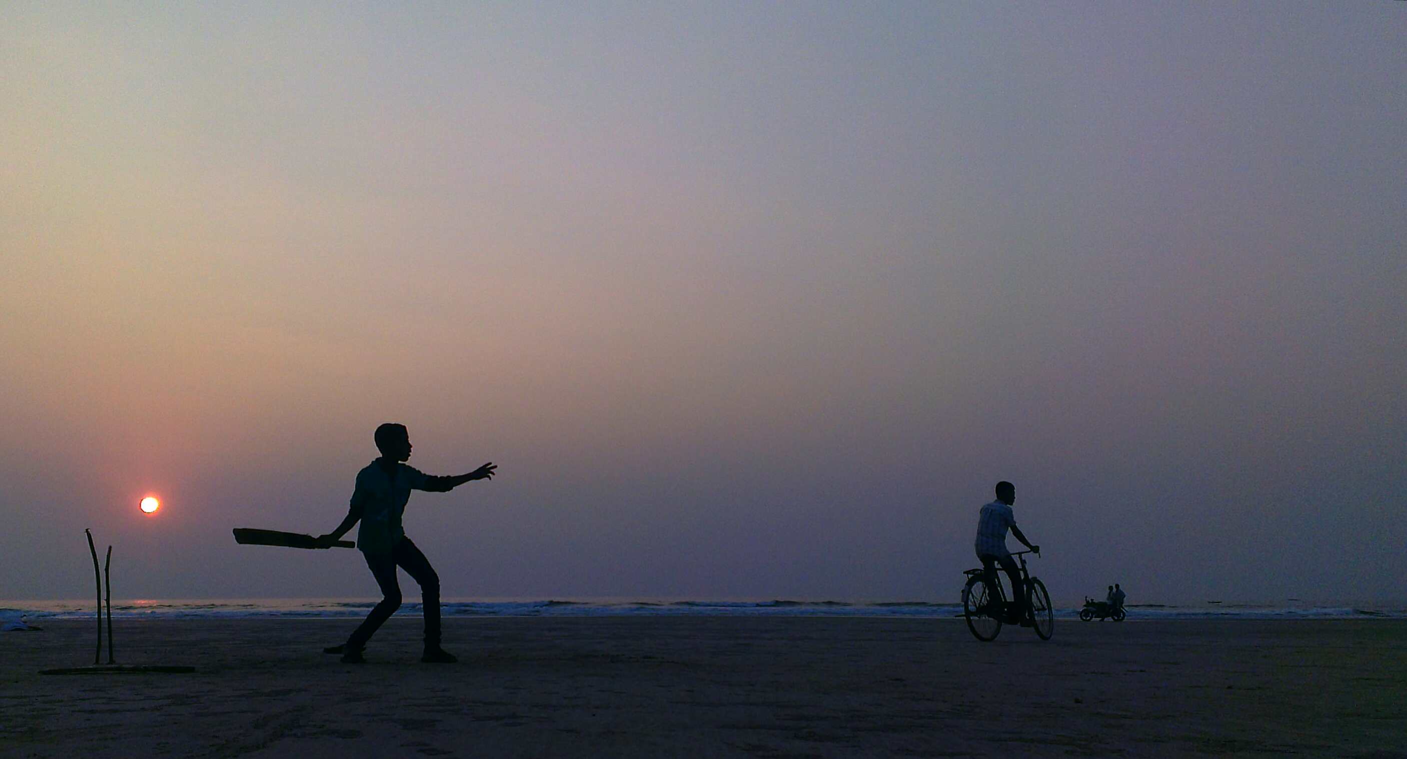 Day 11 playing cricket on the beach at sunset