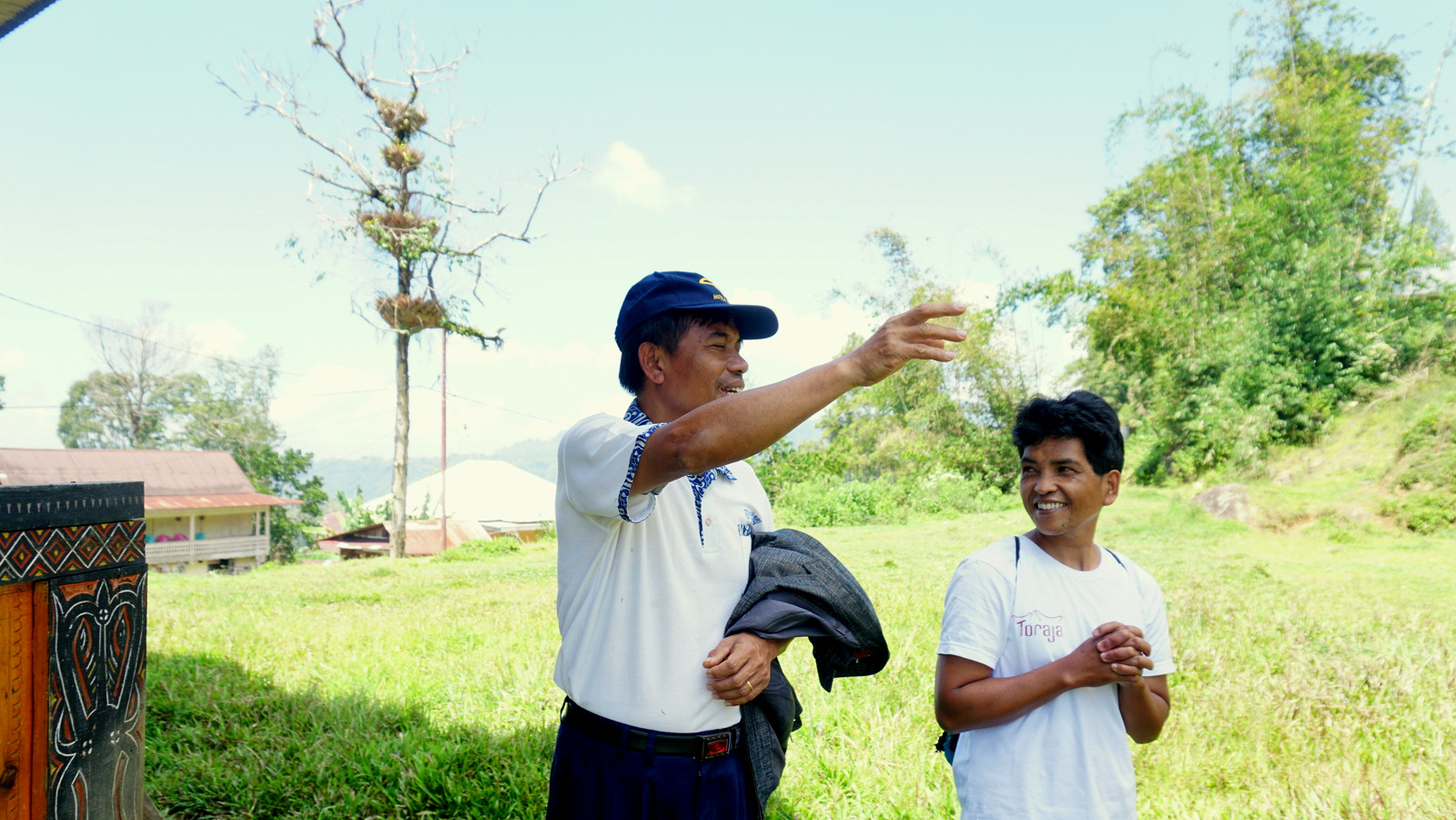 Pak Owen (left), chairman of the Tourism Village Association, and Pak Simone, the association’s treasurer, giving a tour. The association works with Torajamelo to manage tourism to the area. Photo by Upneet Kaur-Nagpal