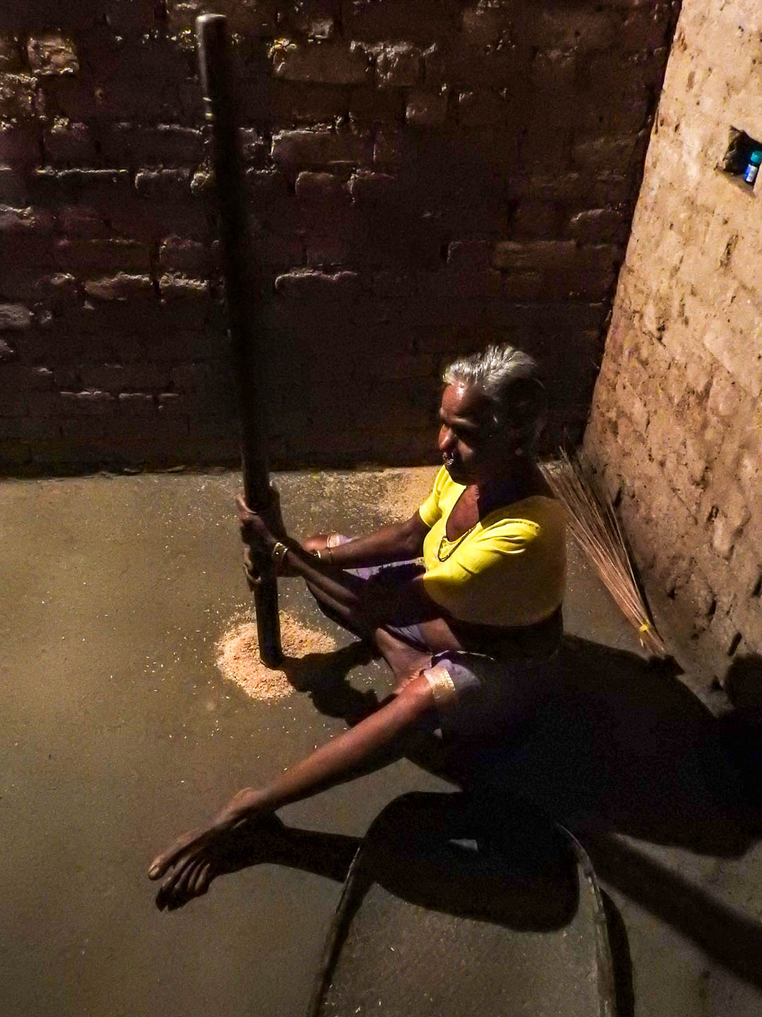 Locals have dedicated rooms for pounding rice, such as demonstrated by this villager. Photo by Elita Almeida.Locals have dedicated rooms for pounding rice, such as demonstrated by this villager. Photo by Elita Almeida.