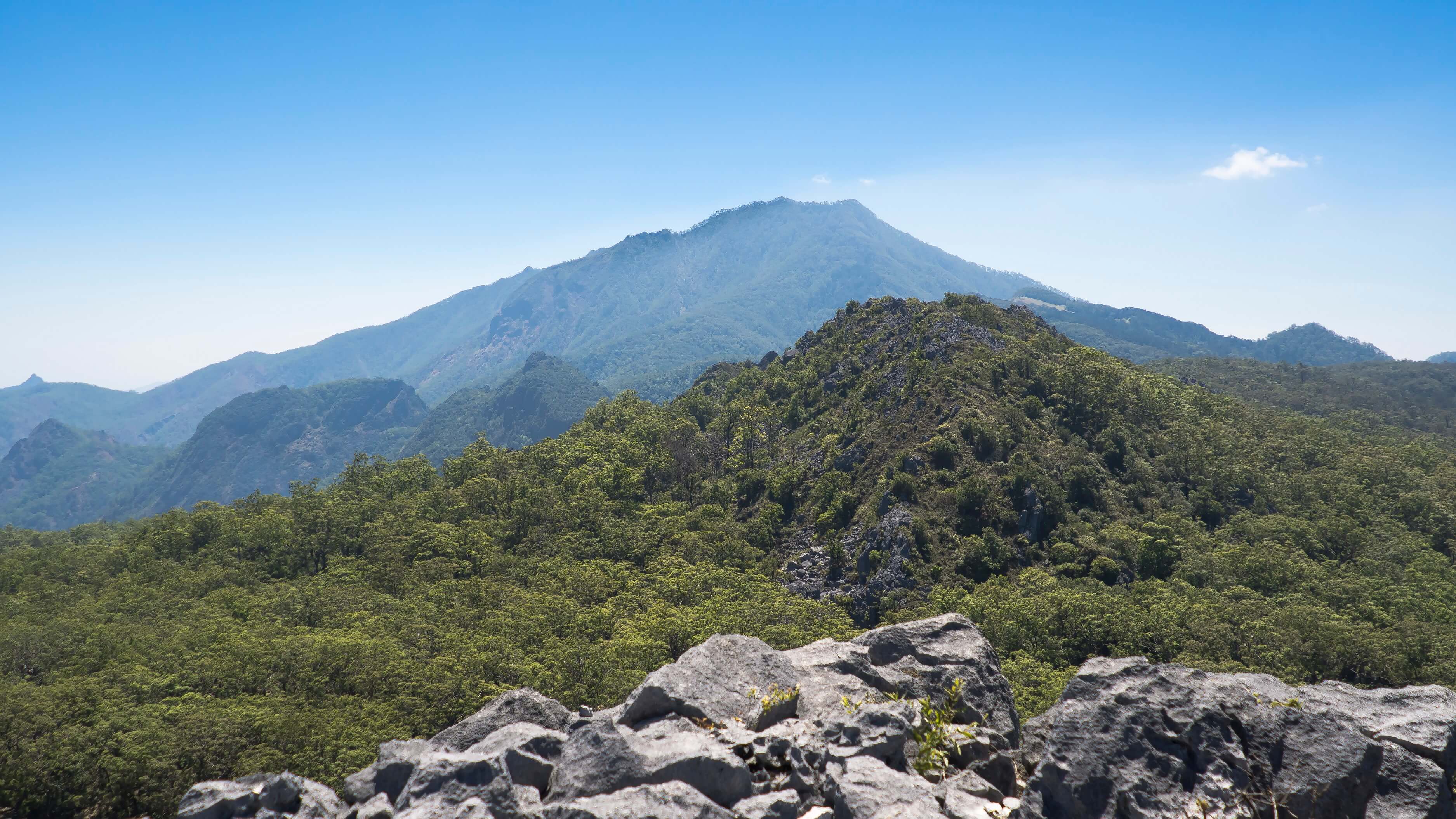 View of Mount Mutis from Benteng Oenino, a rock hill that was believed to serve as a fortress in ancient Timorese wars. Orang Mollo inhabit the foothills of Mount Mutis, the source of four major Timorese rivers. Photo by Andra Fembriarto