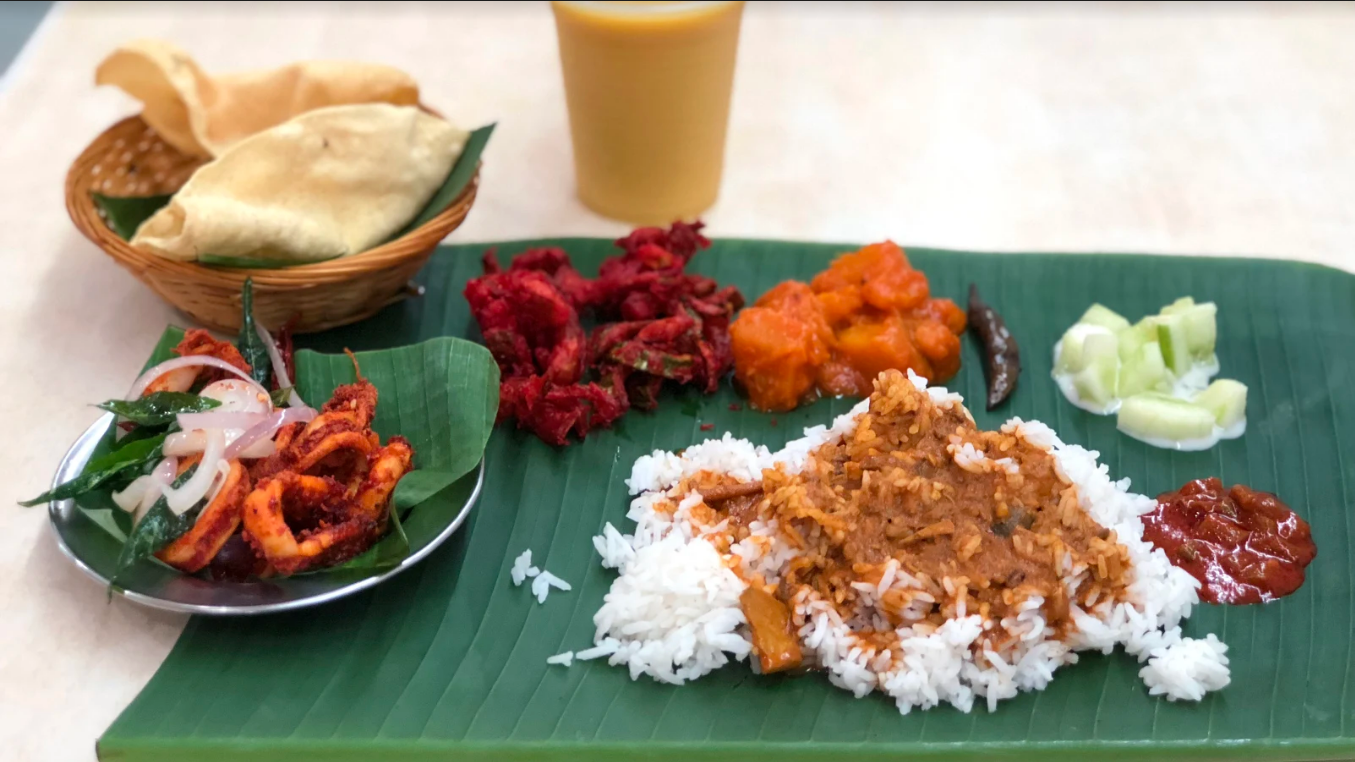 Next, tuck into (one of) the best banana leaf rice in town at Restoran Sri Nirwana Maju, where waiters come round to serve various dishes onto your plate. Photo by Victoria Ong