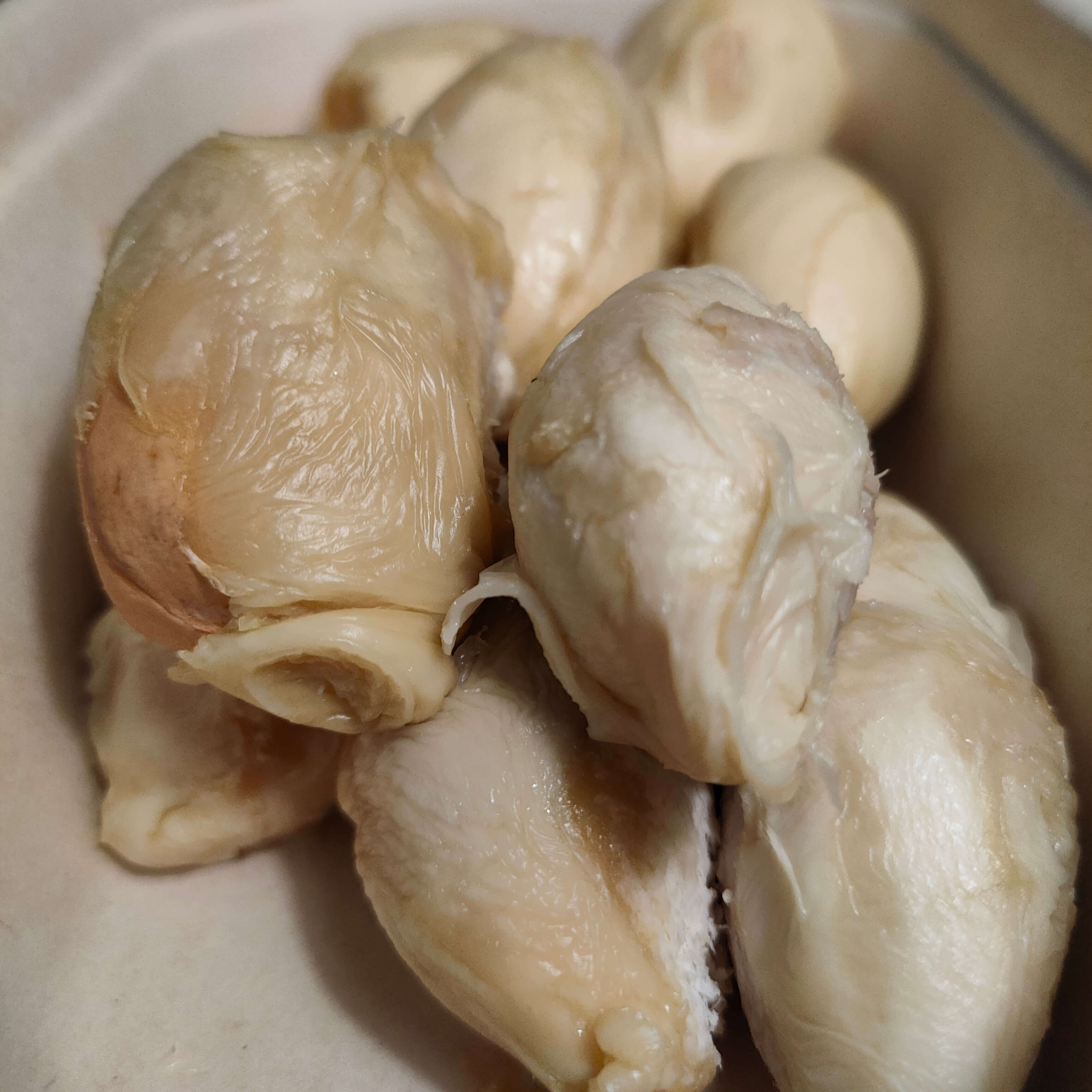 Durian fruit removed from their shell sitting in a box 