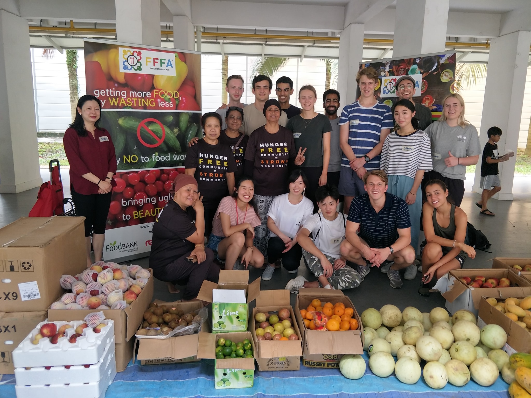 Volunteers prepare to hand out rescued, ugly, but perfectly safe and edible fruit and vegetables to low-income households in Singapore (Photo courtesy of Free Food for All)