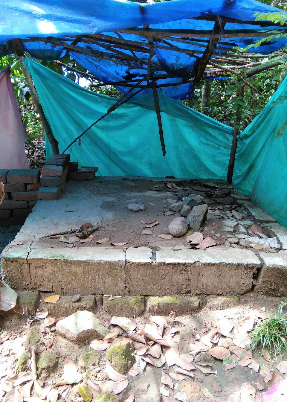 The house of Smitha and her husband A Ramesh (left) was so badly damaged during the floods that they had to put up plastic sheets for walls in the aftermath. With the help of SaveAGram, they built a new home with tin walls. Photo courtesy of SaveAGram