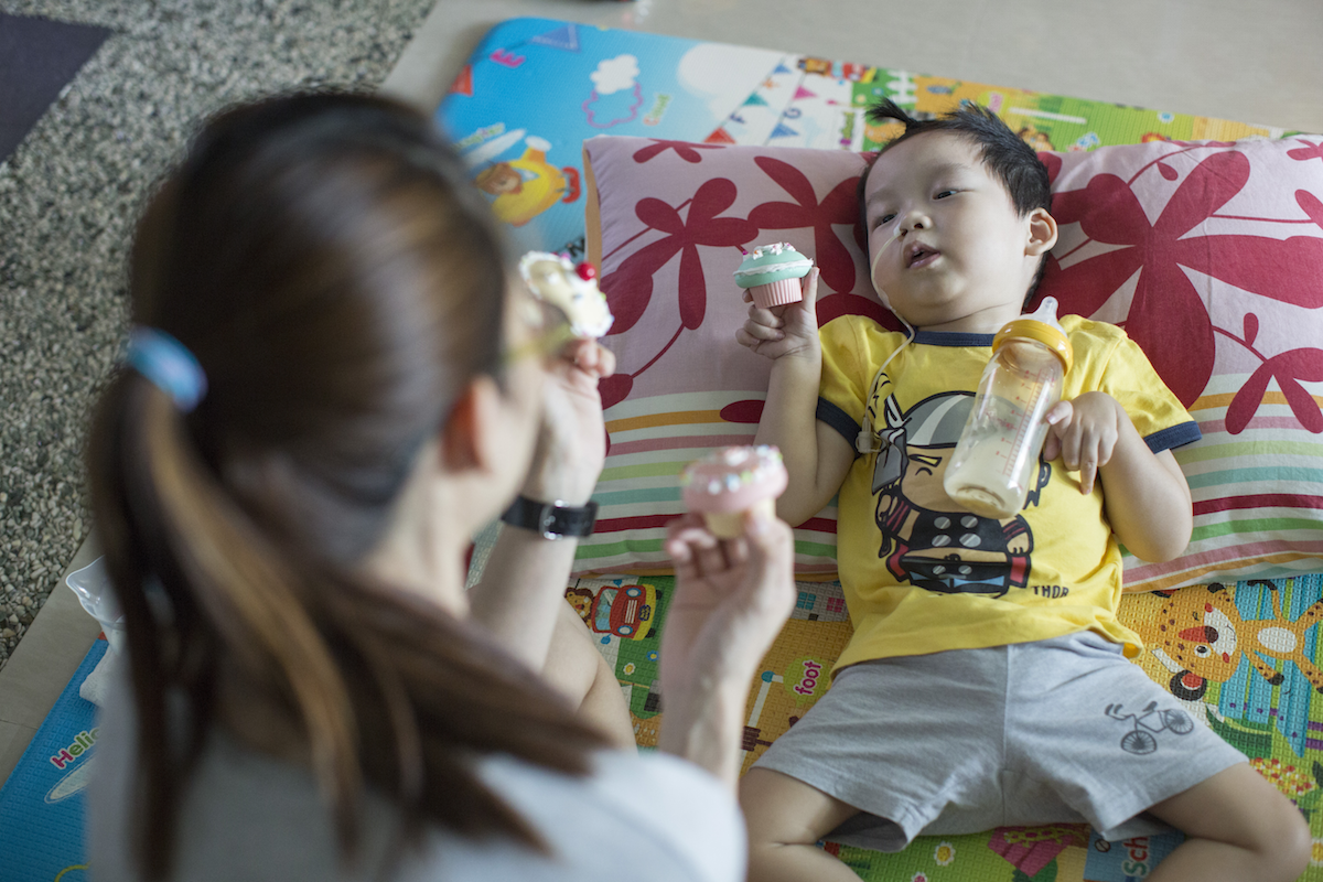 Caelen is a quick learner and very articulate. He often surprises his Mum with his vocabulary, amassed from reading or watching television. When Lowell pointed at the cupcake and asked him what it was, he replied: 'The frosting is green!'