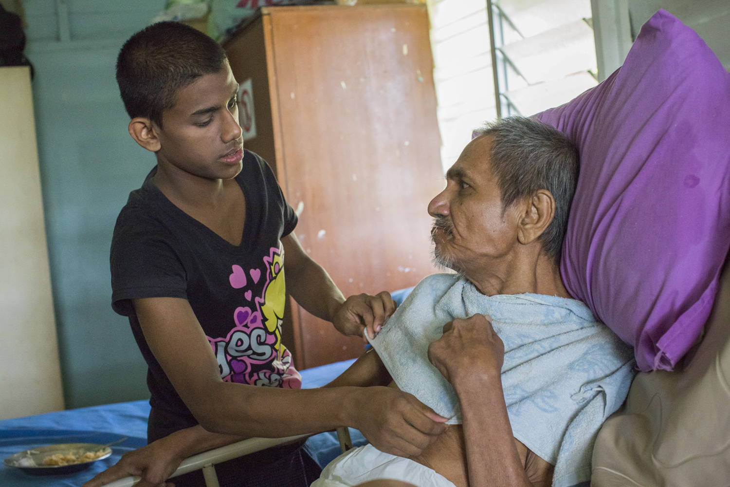 Everyone chips in with what they can at the PLC home. The Rohingya boys often help with serving meals and feeding those who can’t manage on their own.