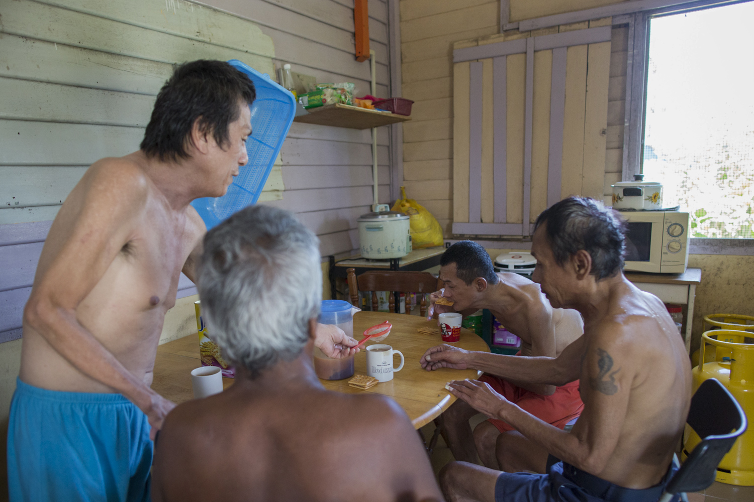 PLC houses older residents at a smaller bungalow, where they enjoy the comforts of sharing meals together at the communal dining table. They divide responsibilities such as cooking and cleaning the house amongst one another.