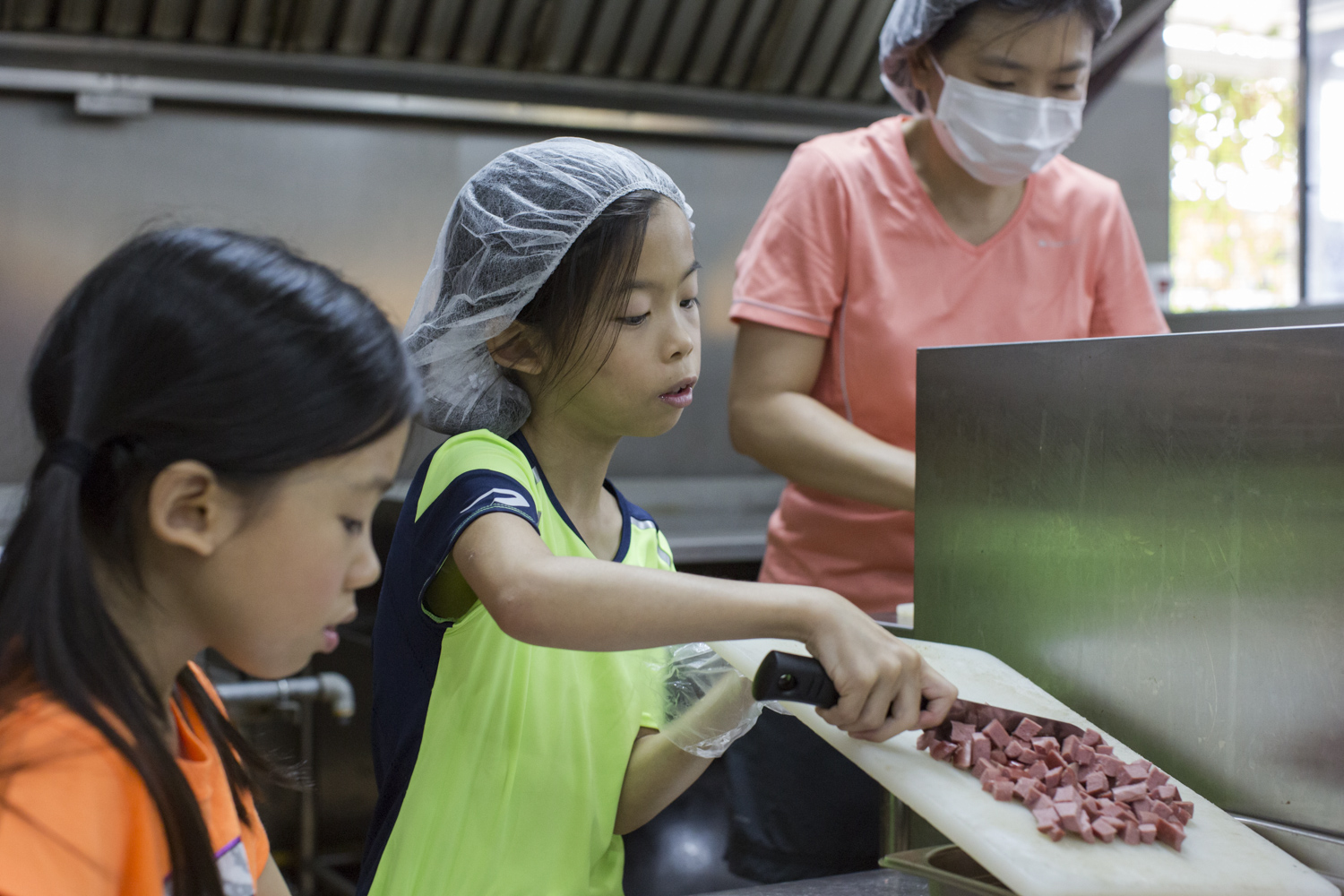 9-year-old Christine was the spark of these family outings. Having boundless energy and always curious, she’d coax her mother Dorothy to take her out on these volunteering stints whenever the school holidays came around.