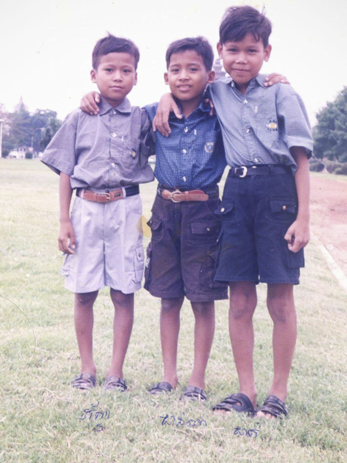 9 year-old Sophanna (in the middle) with his brothers in Phnom Penh, Cambodia. Sophanna lost his parents when he was 6 years old, and he was cared for by his grandparents before moving to an orphanage in Siem Reap in 2005. Image courtesy of Brak Sophanna.