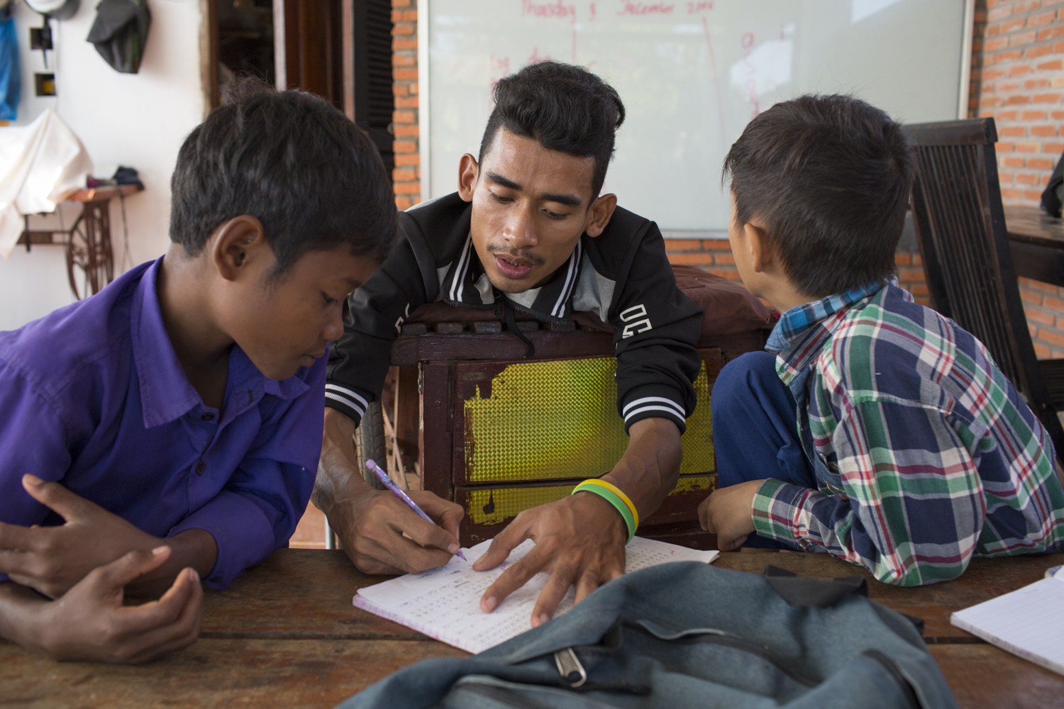 Sophanna loves teaching, and feels it’s important to give back to the community wherever possible. Having picked up English at the orphanage he grew up in, he teaches simple alphabets and words to a group of 6 to 7 students. Sophanna loves teaching, and feels it’s important to give back to the community wherever possible. Having picked up English at the orphanage he grew up in, he teaches simple alphabets and words to a group of 6 to 7 students.
