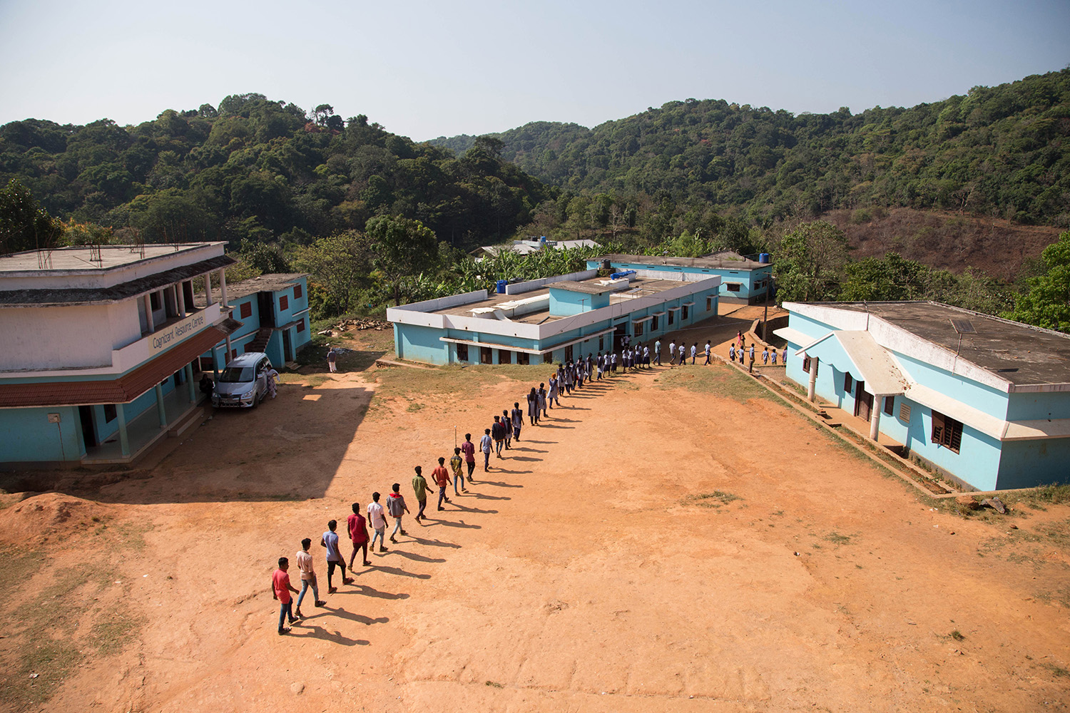 The Vivekananda Residential Tribal Vidyalaya first started in 2002 with just one shed, and a single class of 42 children. There was no electricity, and no road. Through donations, the school has grown to a handful of buildings and 250 students. The Vivekananda Residential Tribal Vidyalaya first started in 2002 with just one shed, and a single class of 42 children. There was no electricity, and no road. Through donations, the school has grown to a handful of buildings and 250 students.