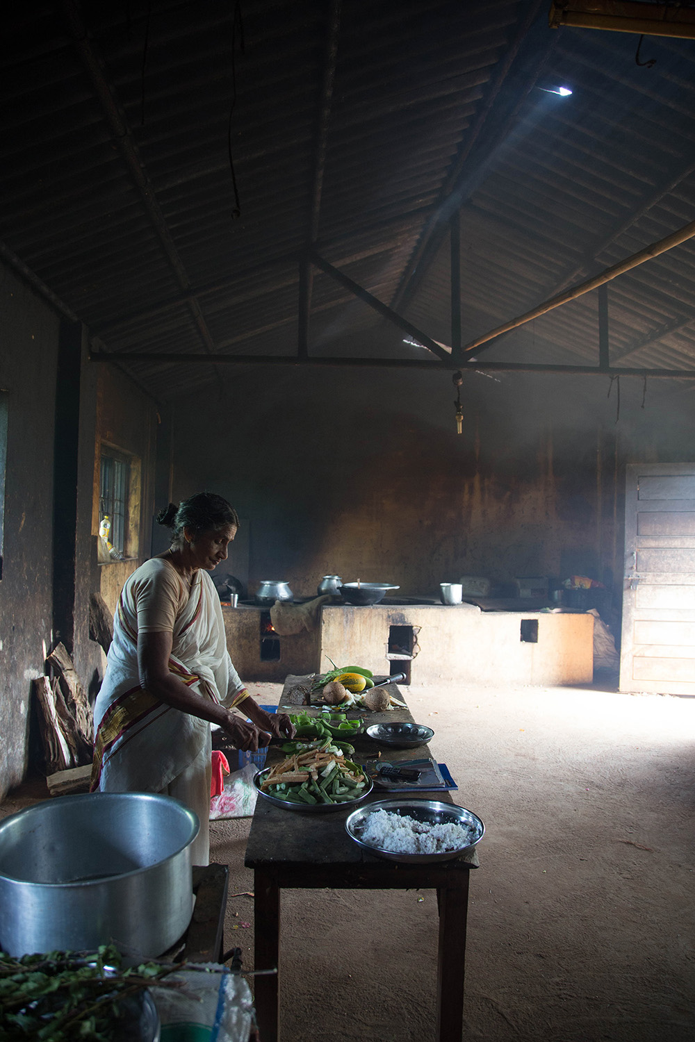 With some help from students, the chef makes roughly 750 meals per day in this kitchen. Lunch is simple: rice, dal and some vegetables.