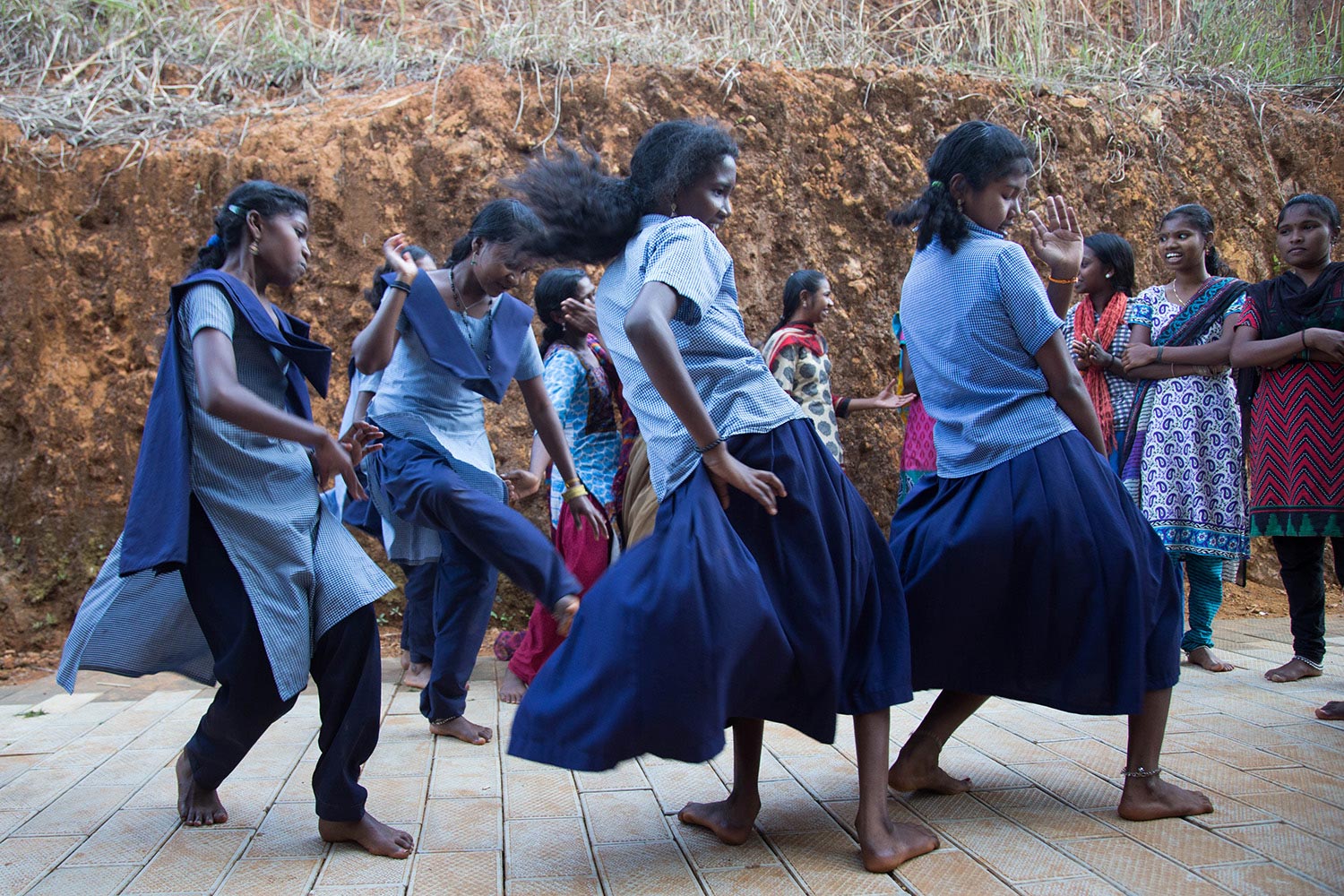 A small group of girls loves to sing, dance and perform. They have their modern favourite songs, and they also know traditional tribal dances.