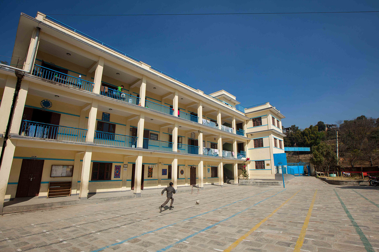 Besides classrooms, there is a dormitory and a courtyard where students get to play