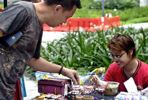 Low Mary, who helps marginalised people in Singapore: "My booth is special because I'm helping someone else too." See her story at http://www.ourbetterworld.org/story/crutches-cant-stop-her Our Better World superwoman Mary