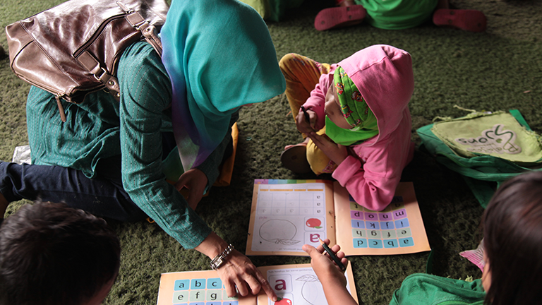 Children learning numbers through classes run by Inspiration Factory Foundation