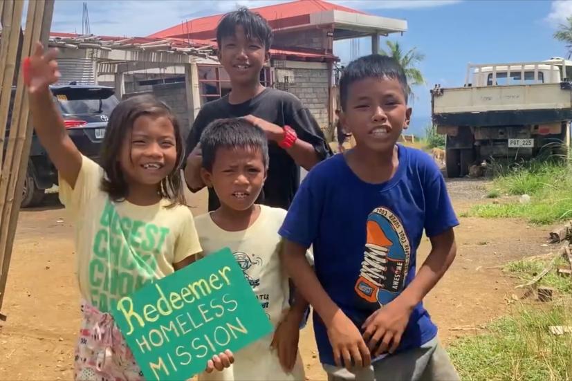 kids with sign