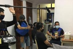 Camera men filming behind the scene of a video