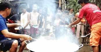 Rain or shine, they climb mountains to feed the hungry