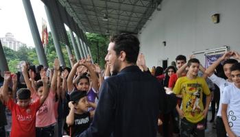 In Malaysia, a refugee community that keeps giving