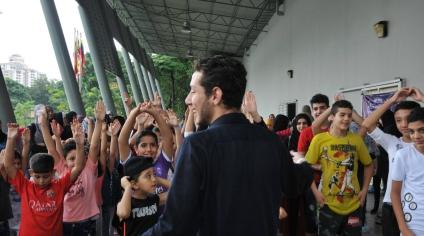 In Malaysia, a refugee community that keeps giving