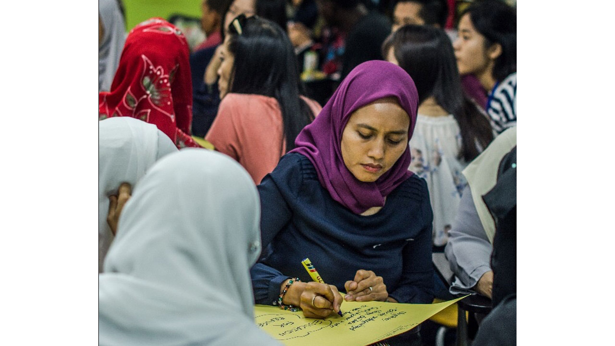 In Malaysia, a Refugee Community that Keeps Giving