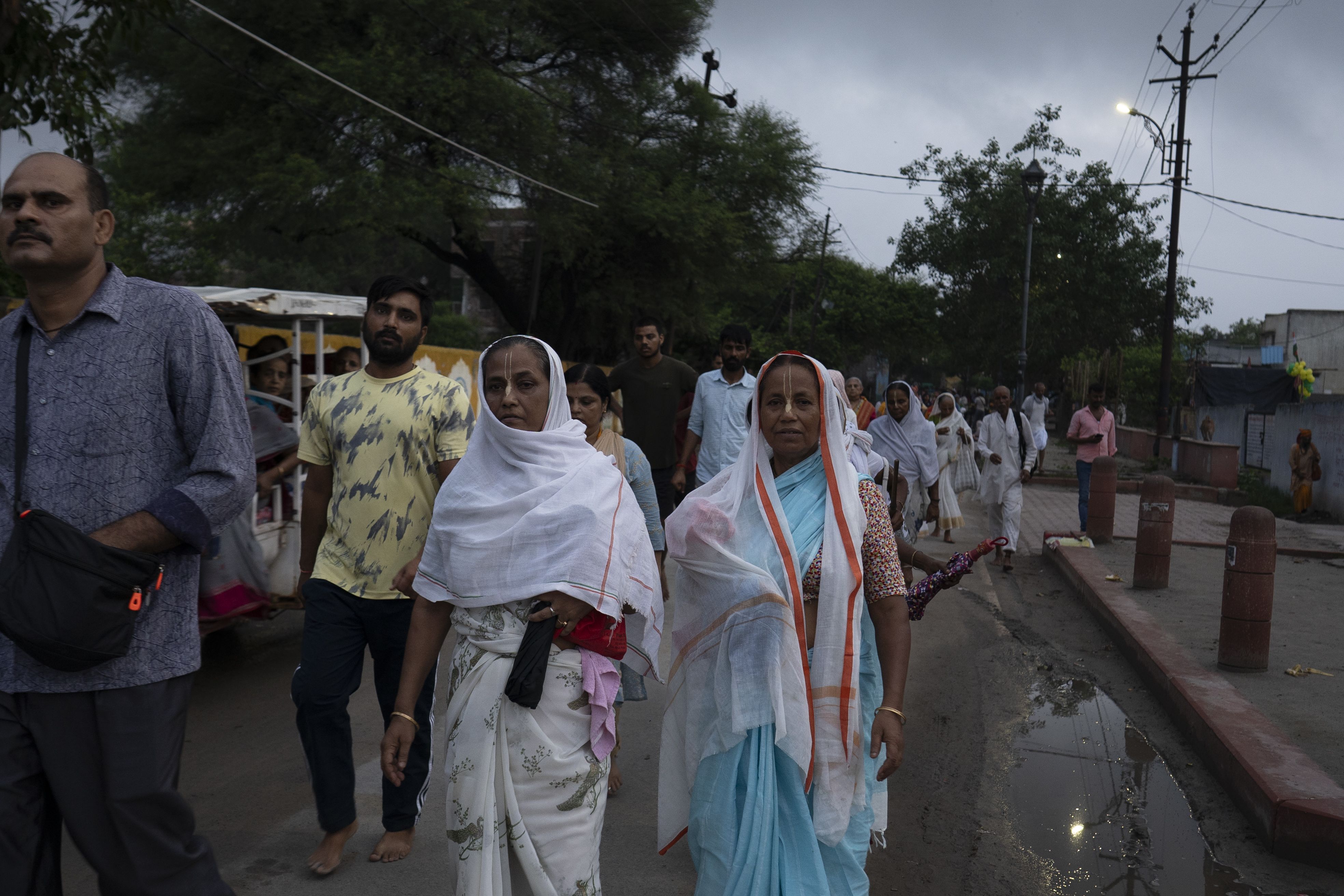 Widows throng the city to visit holy sites during Hindu festivals.
