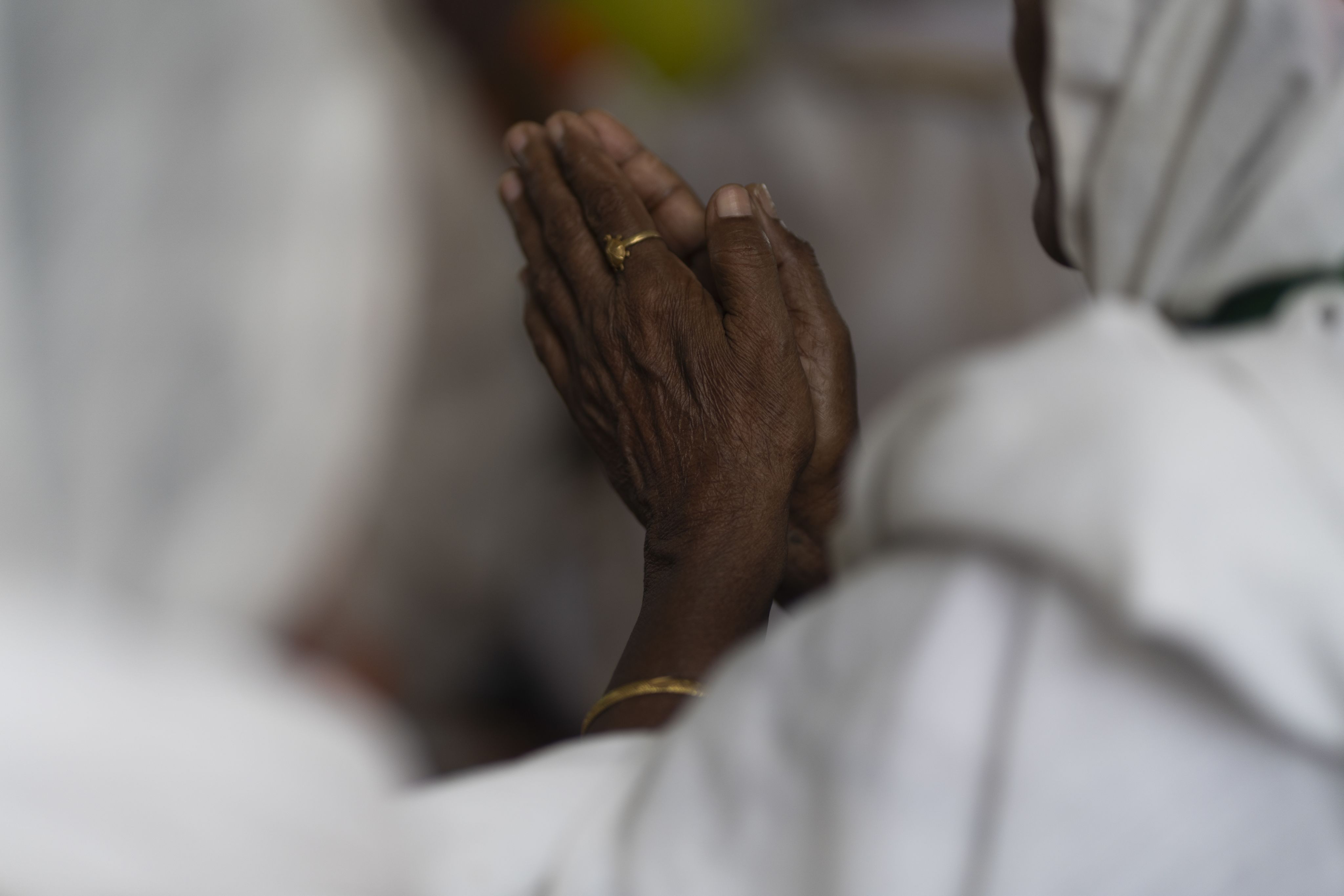 A lady sleeping on the streets of Vrindavan