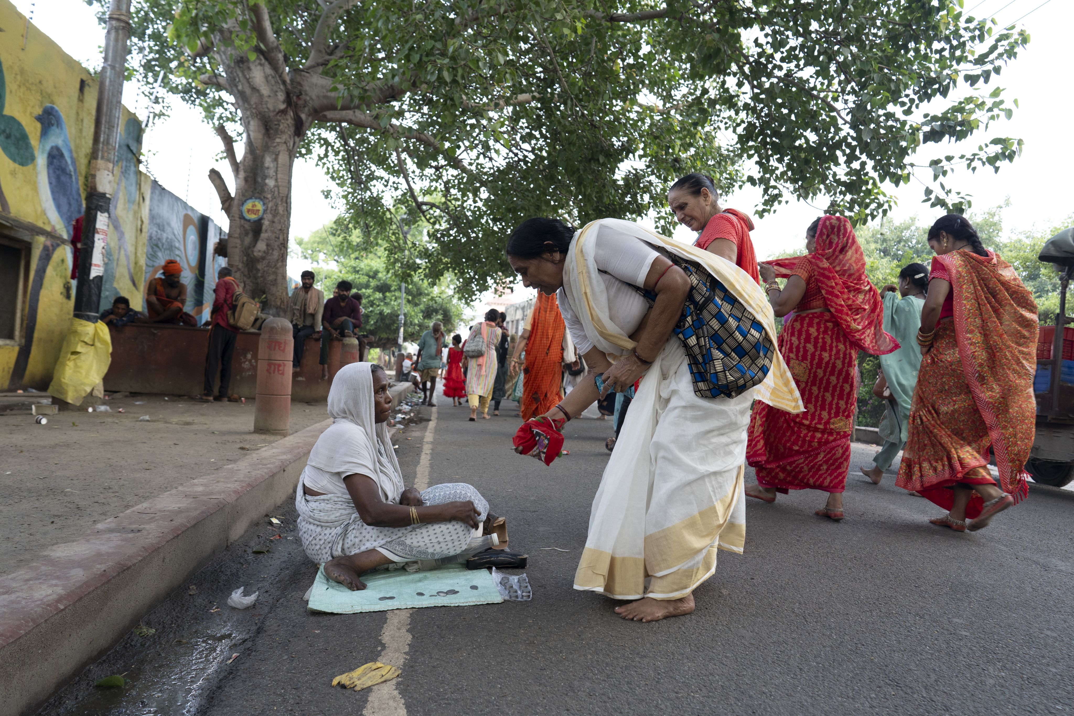 India's holy city of Vrindavan is home to many destitute widows who collect alms for survival.